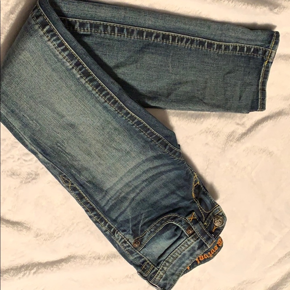 Rock revival jeans, straight/skinny, no rips.